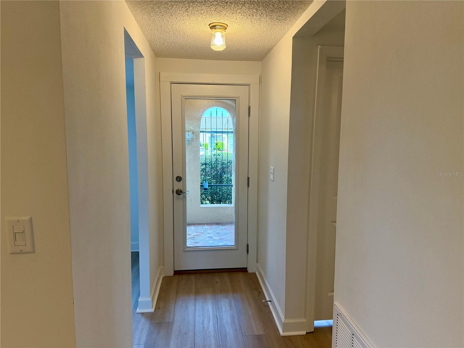 View from Dining Area to Front Door.