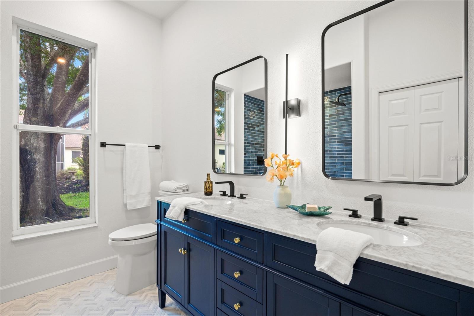 Beautifully updated third full bath - shared by bedrooms 4 & 5