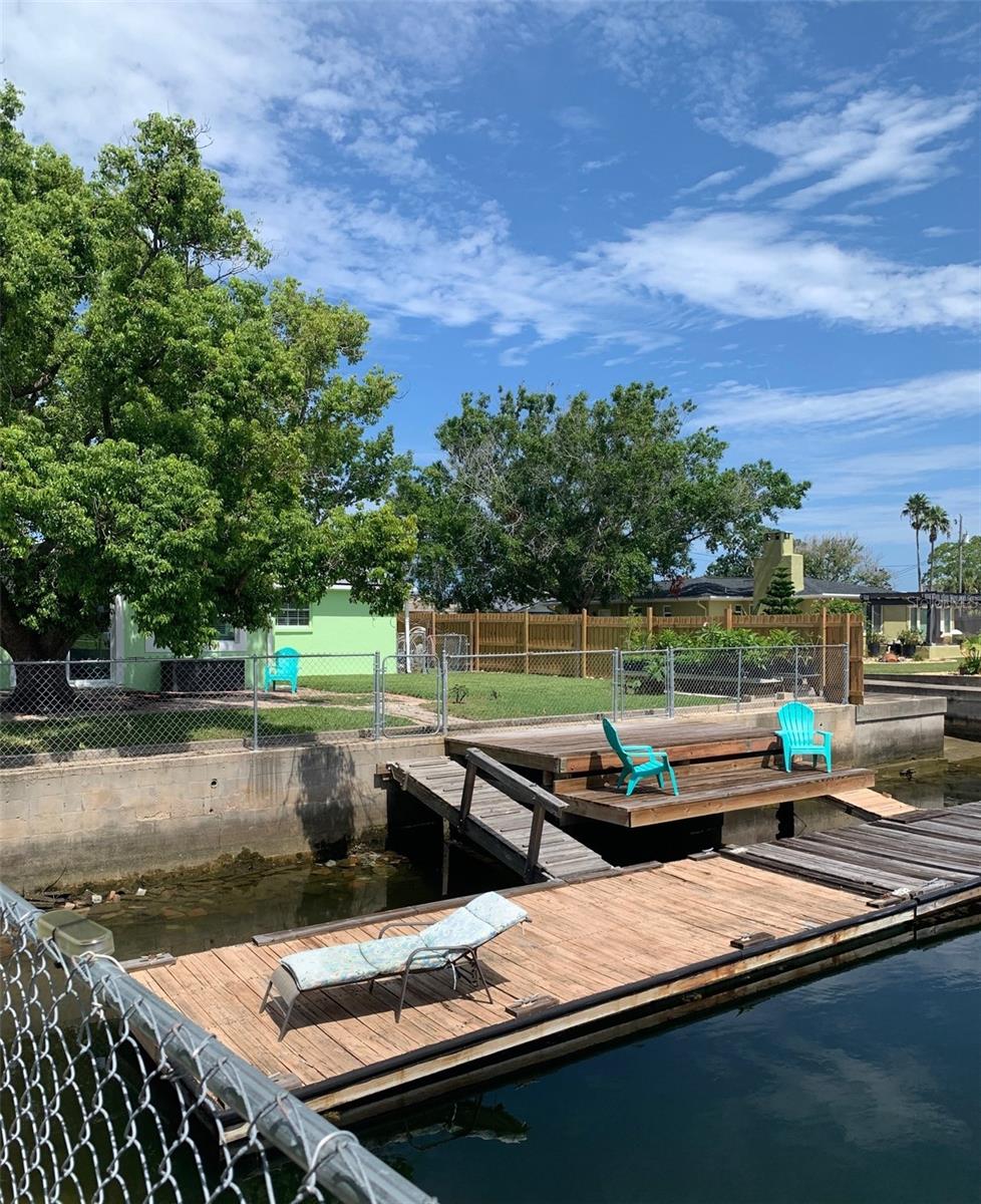 This home offers 110 feet of seawall with a 40 foot floating dock.  Upper stationary main dock rewooded in 2021.