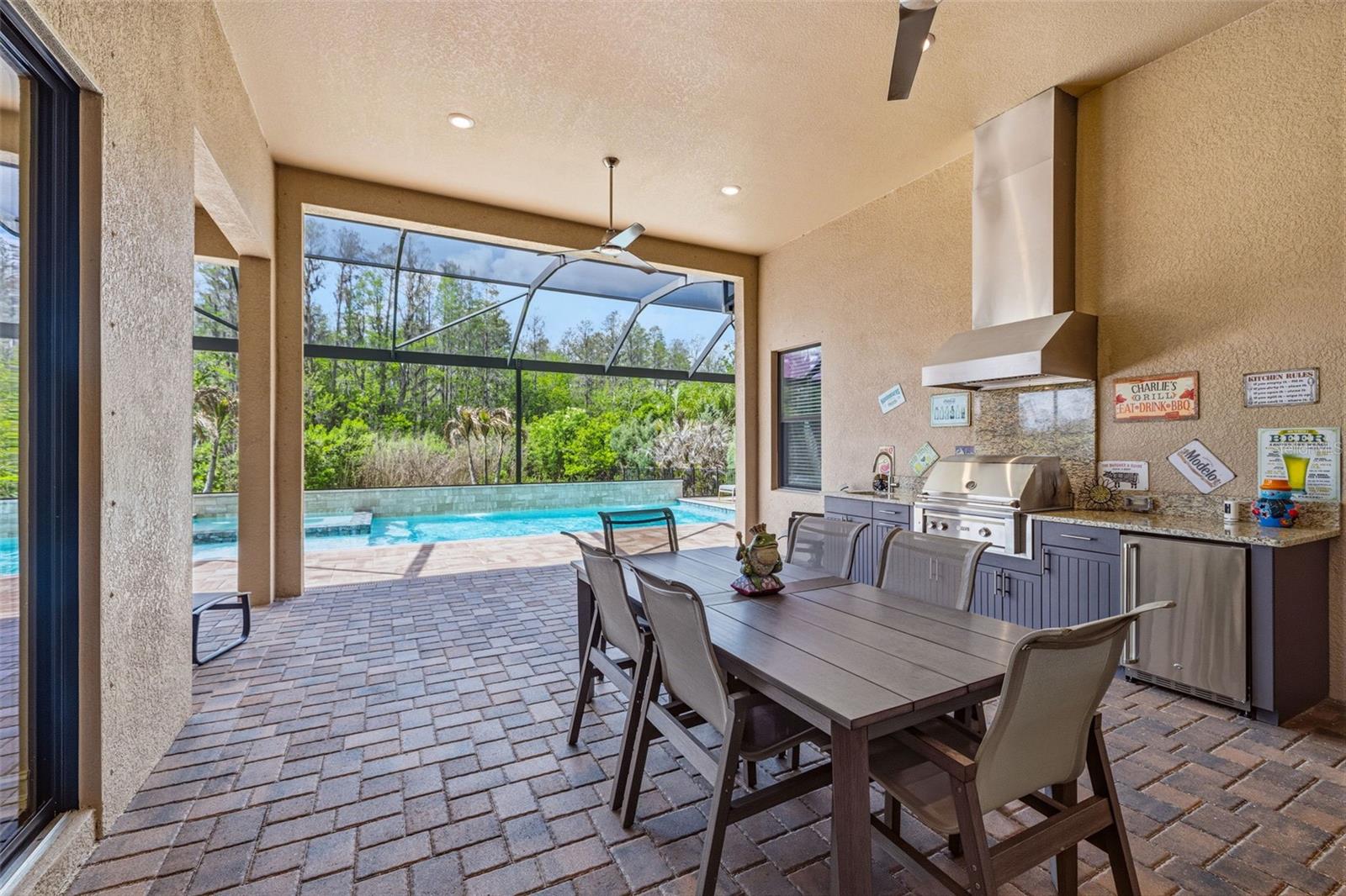 COVERED, SCREENED LANAI W/OUTDOOR KITCHEN