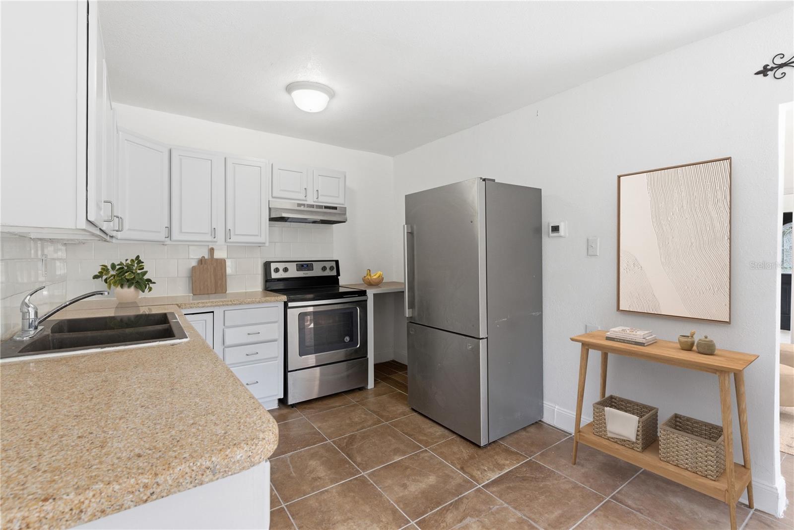 Kitchen with stainless steel appliances