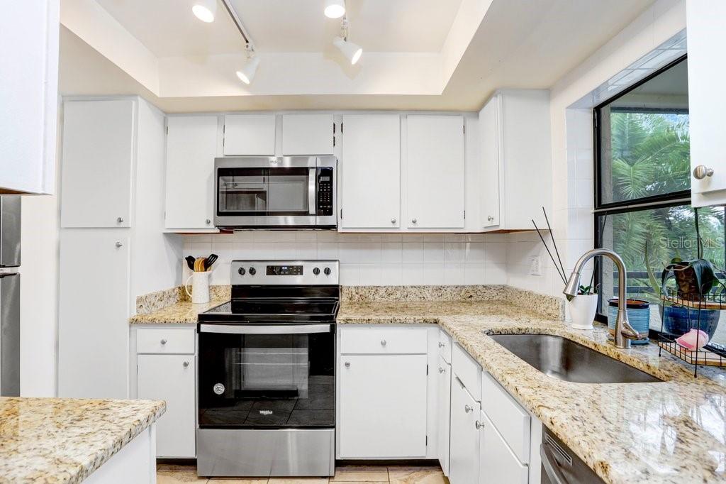 Kitchen off of Living Spaces