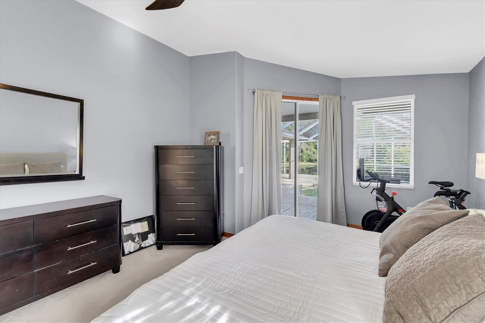 Primary Suite - Sliders to the pool