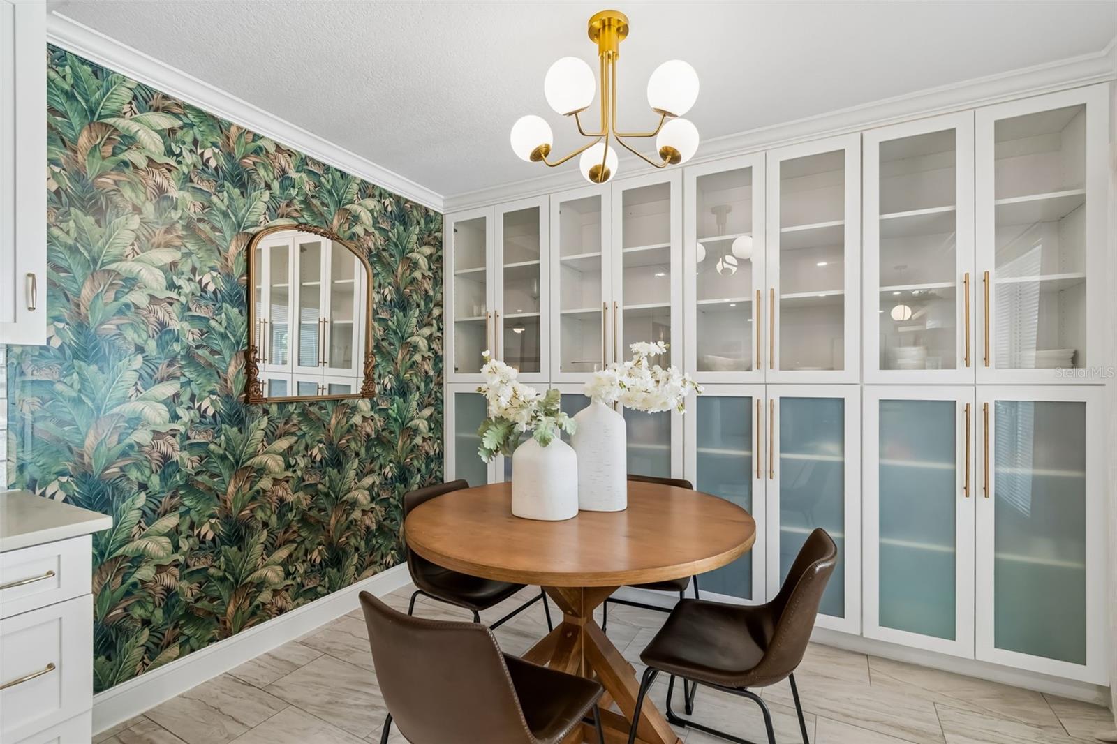 Designer lighting in this breakfast nook. Notice the built ins and storage.