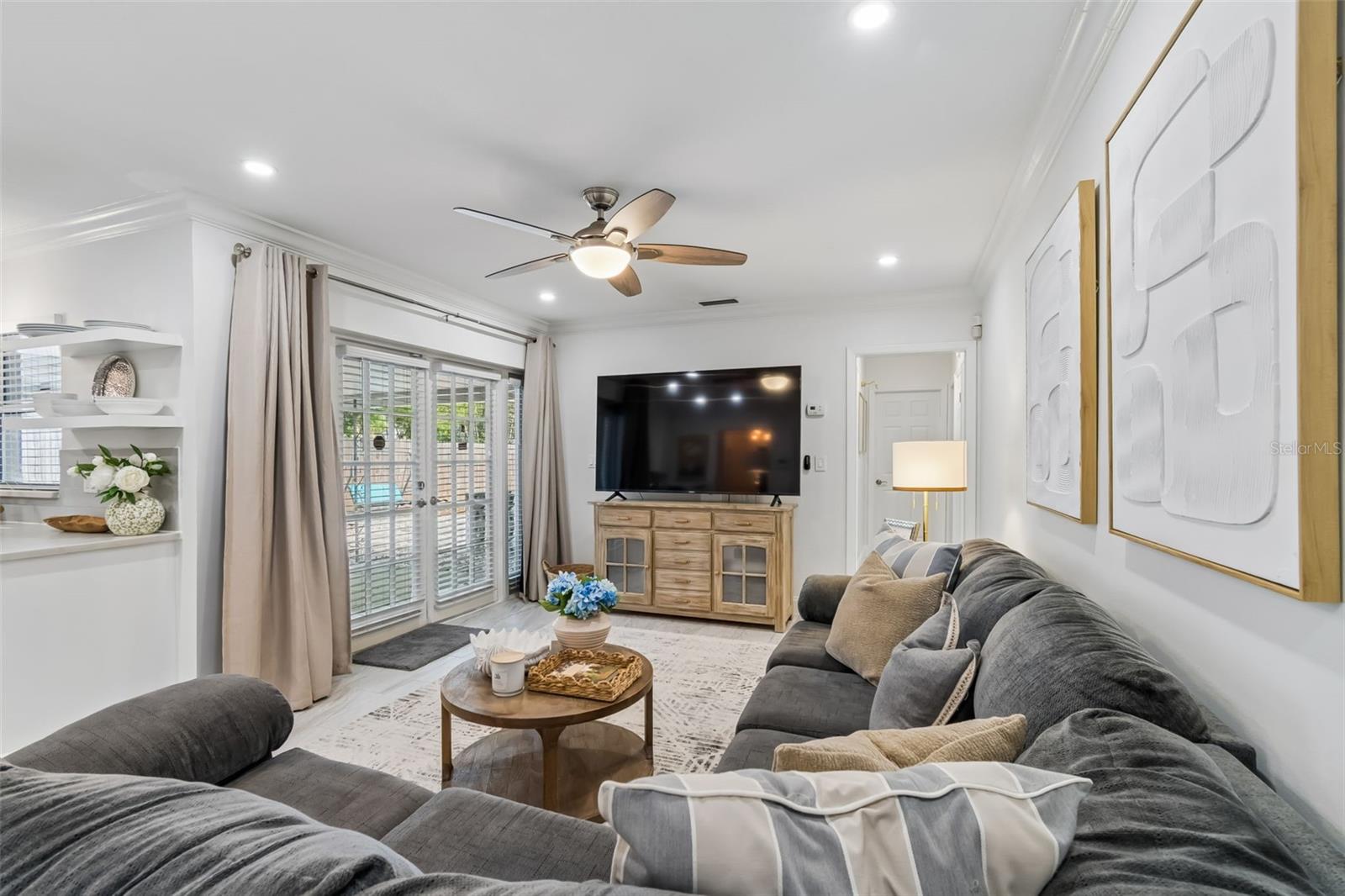Family Room has French doors to enormous backyard.