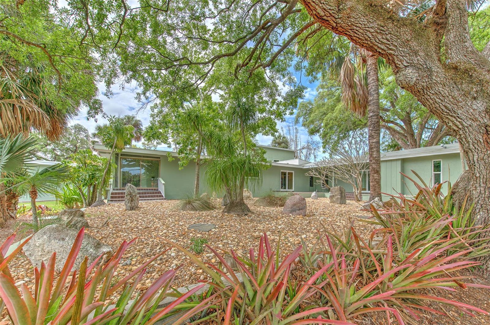 Backyard views of home & rock garden