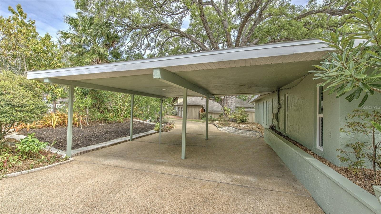 Carport and circular driveway
