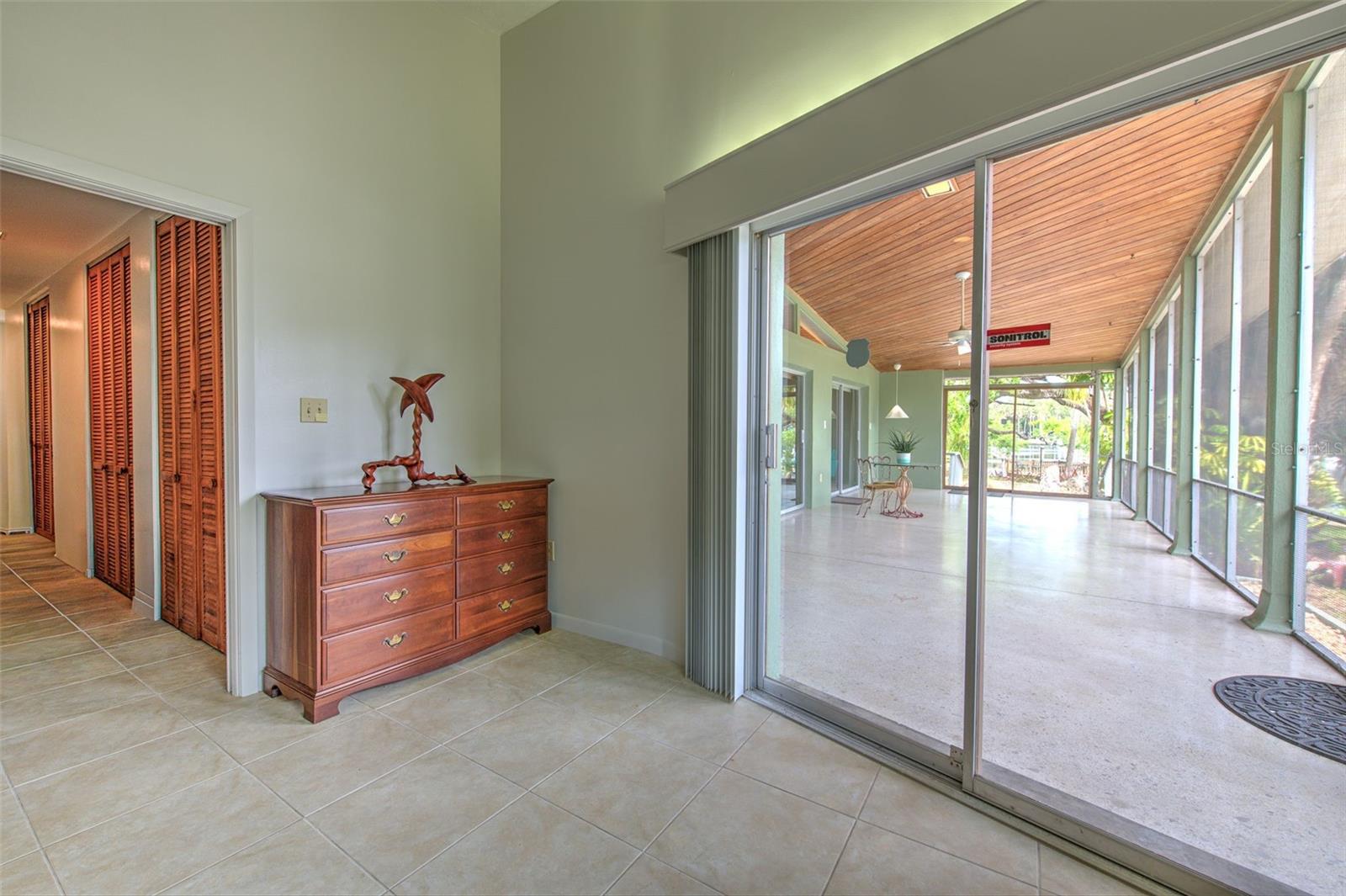 Master Bedroom 2 overlooking lanai & water views