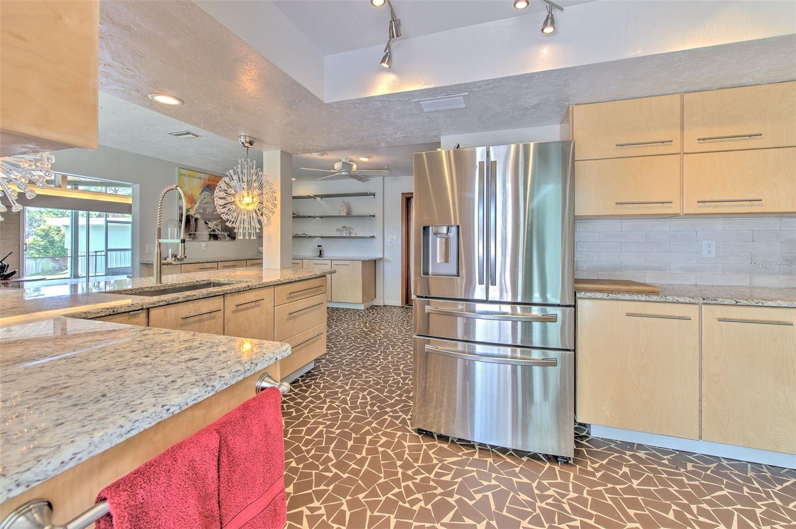 Huge kitchen, custom cabinetry, beautiful granite countertops , stainless steel appliances