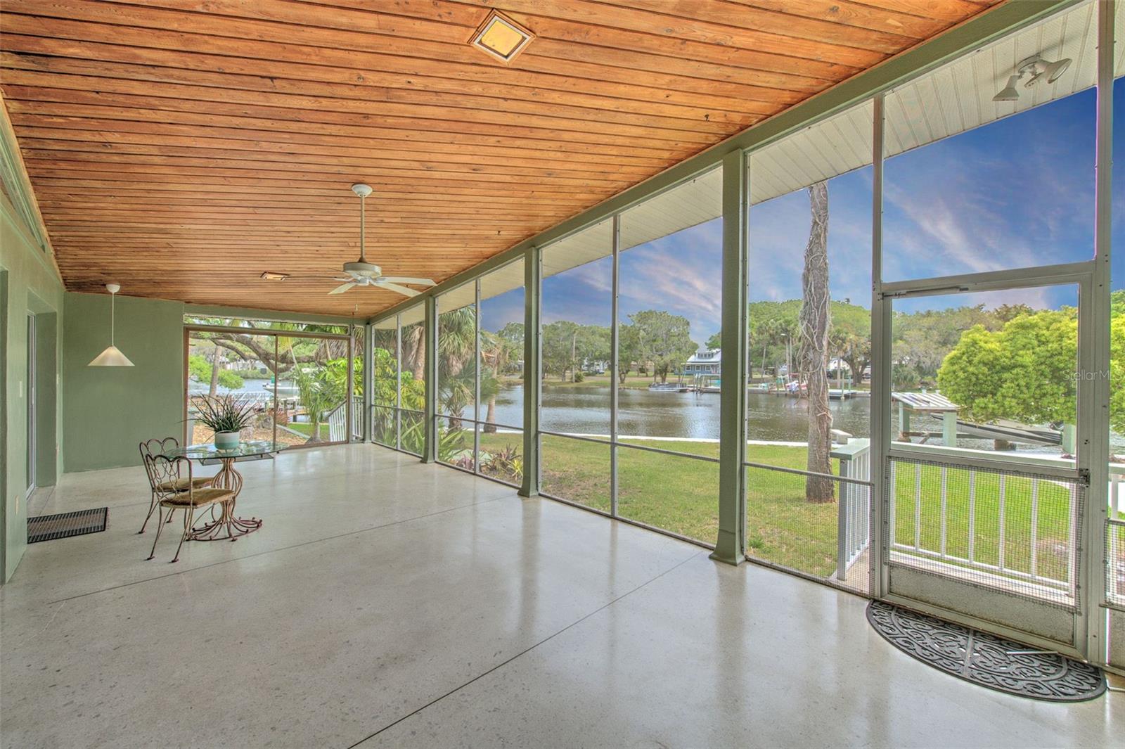Screen-In Lanai with stunning waterfront views
