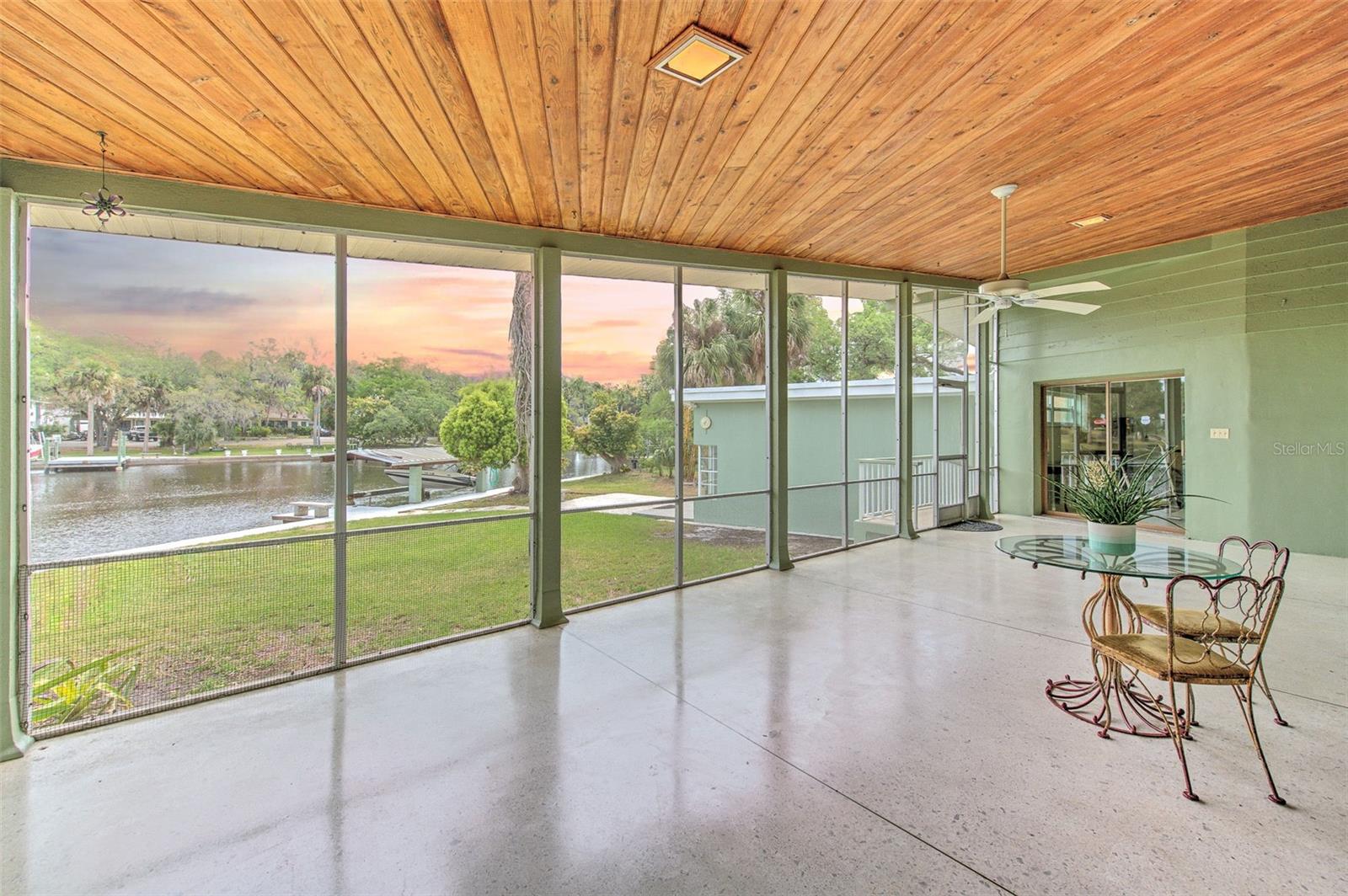 Screen-In Lanai with stunning waterfront views