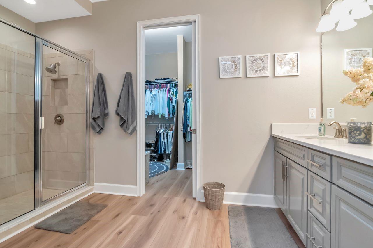 Primary Bath to walk in closet