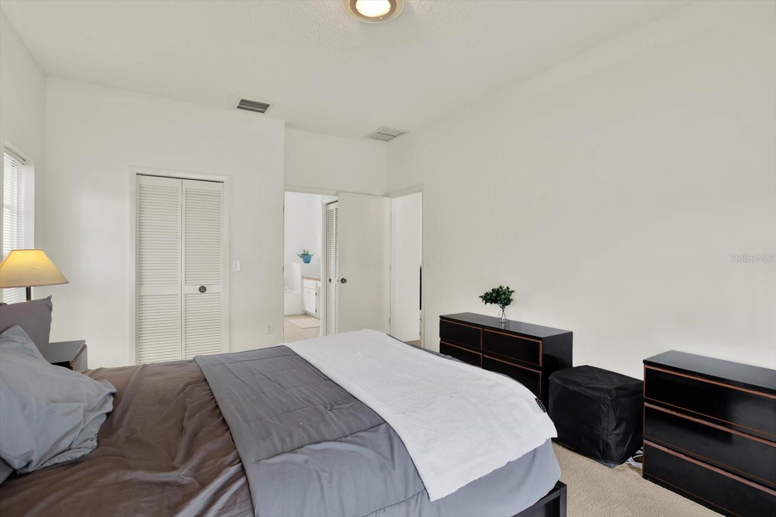 Primary features ensuite and walk in closet