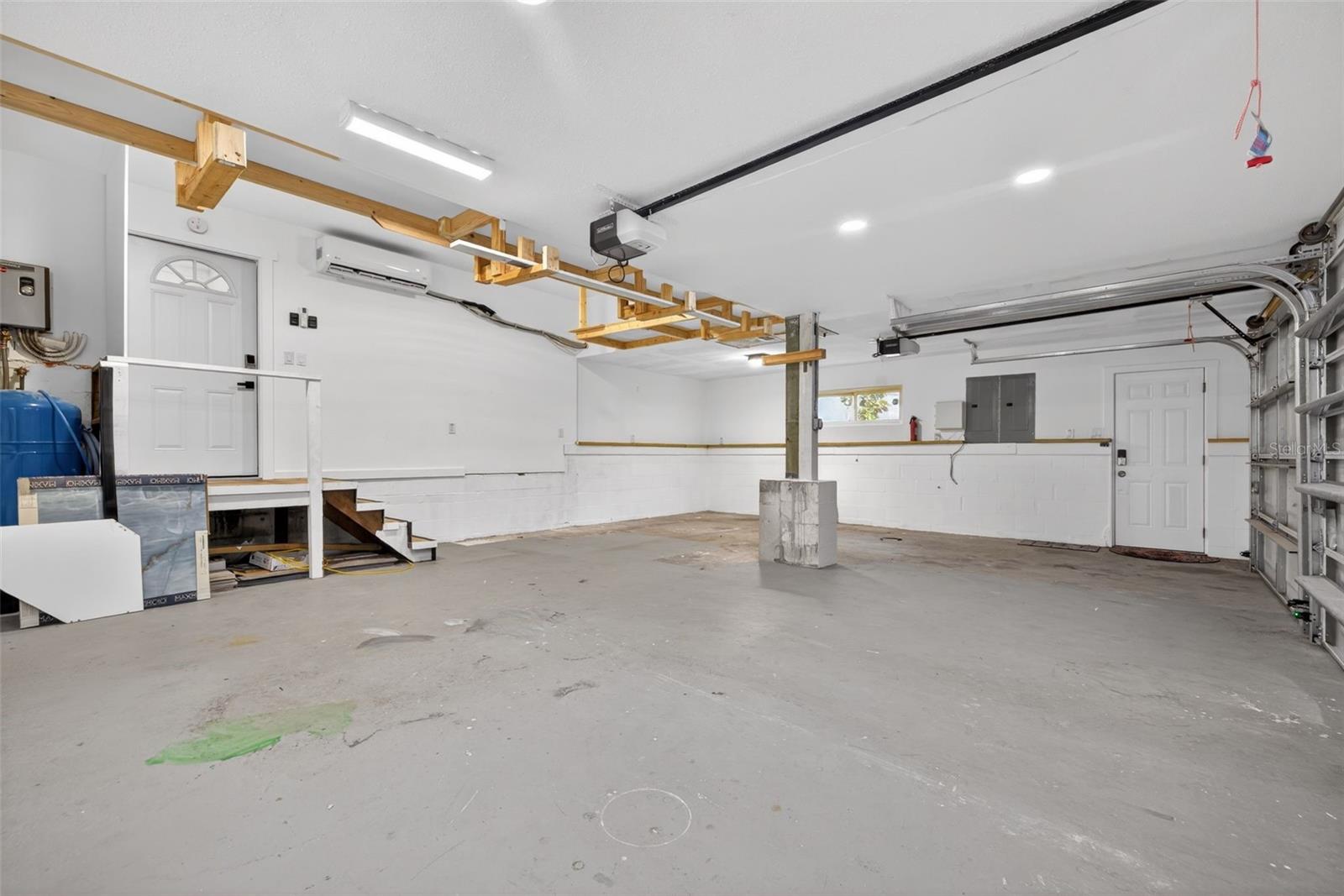 3-car garage with overhead storage. 2x 200amps electrical panes updated in 2023. 400 amps total.