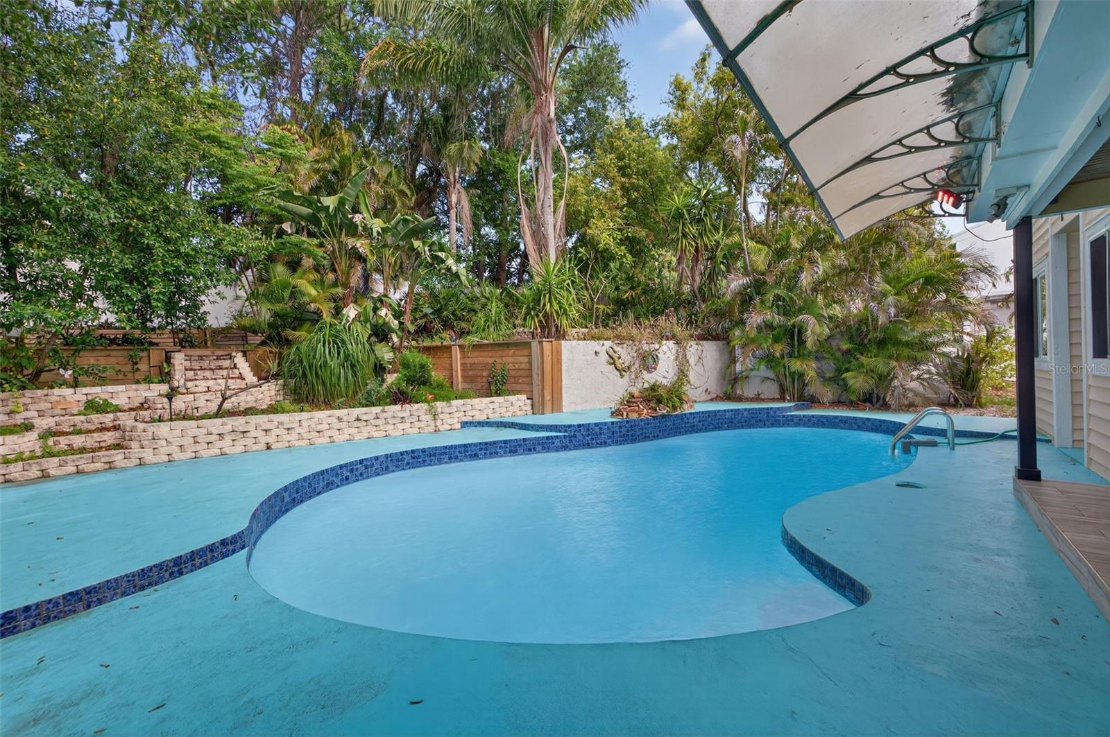 Pool area - newer pool pump and tiles.
