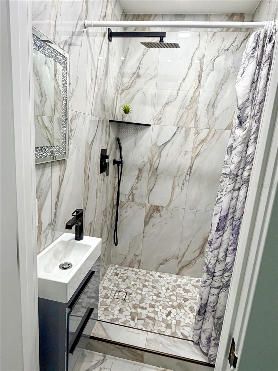 Half bath in the office/extra room.