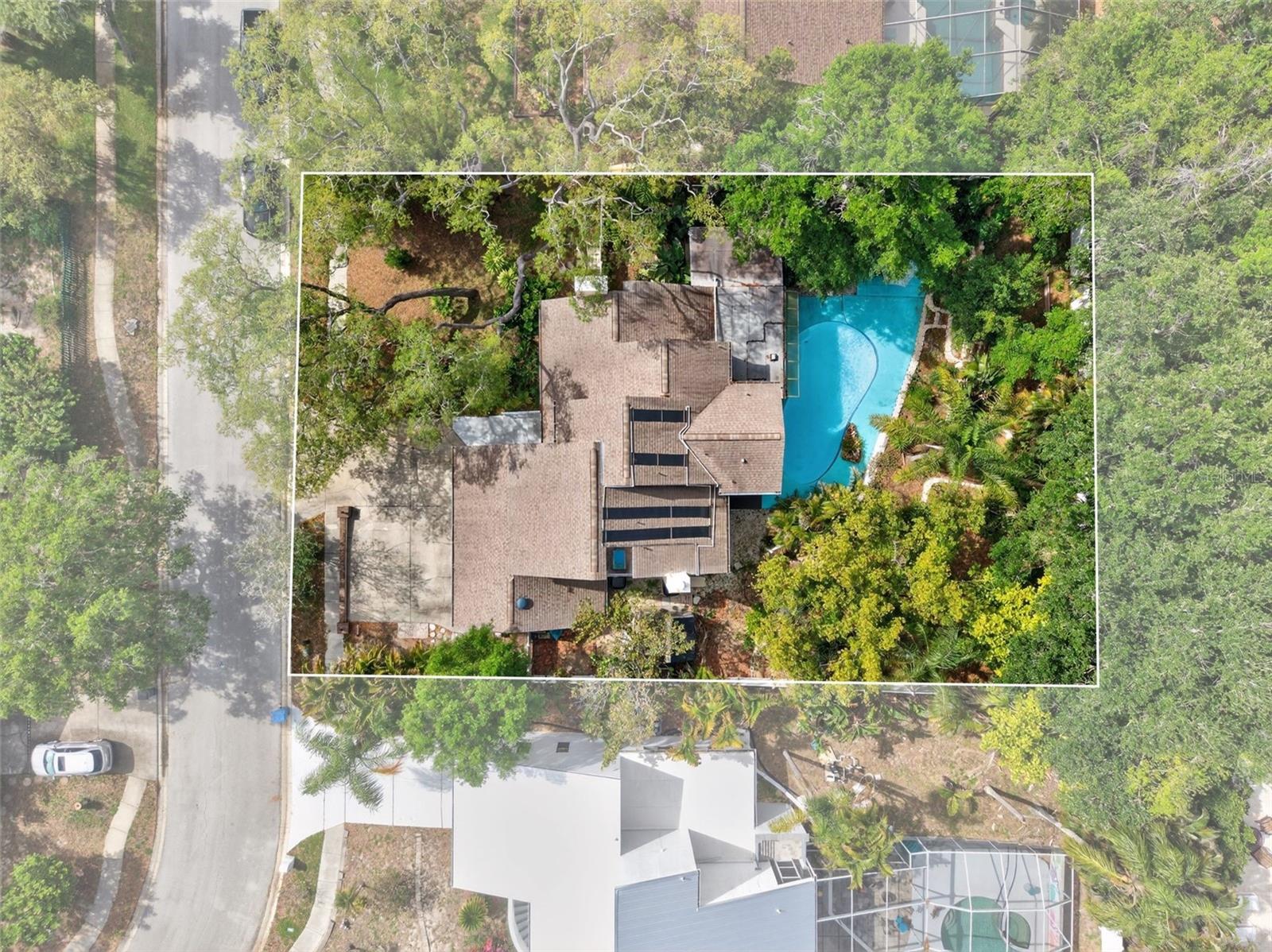 Property lines are approximate (please confirm), but according to the property appraisal website, the lot has 12855 sq.ft.