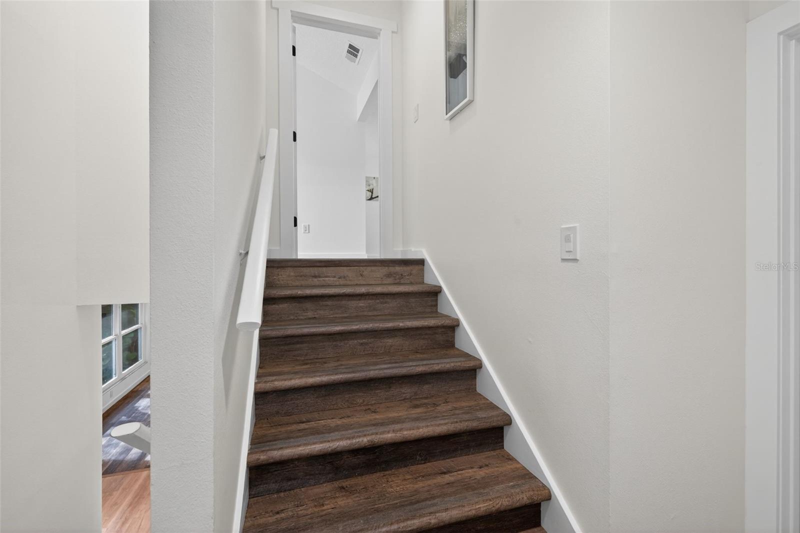 Stairs to the master bedroom/suite.
