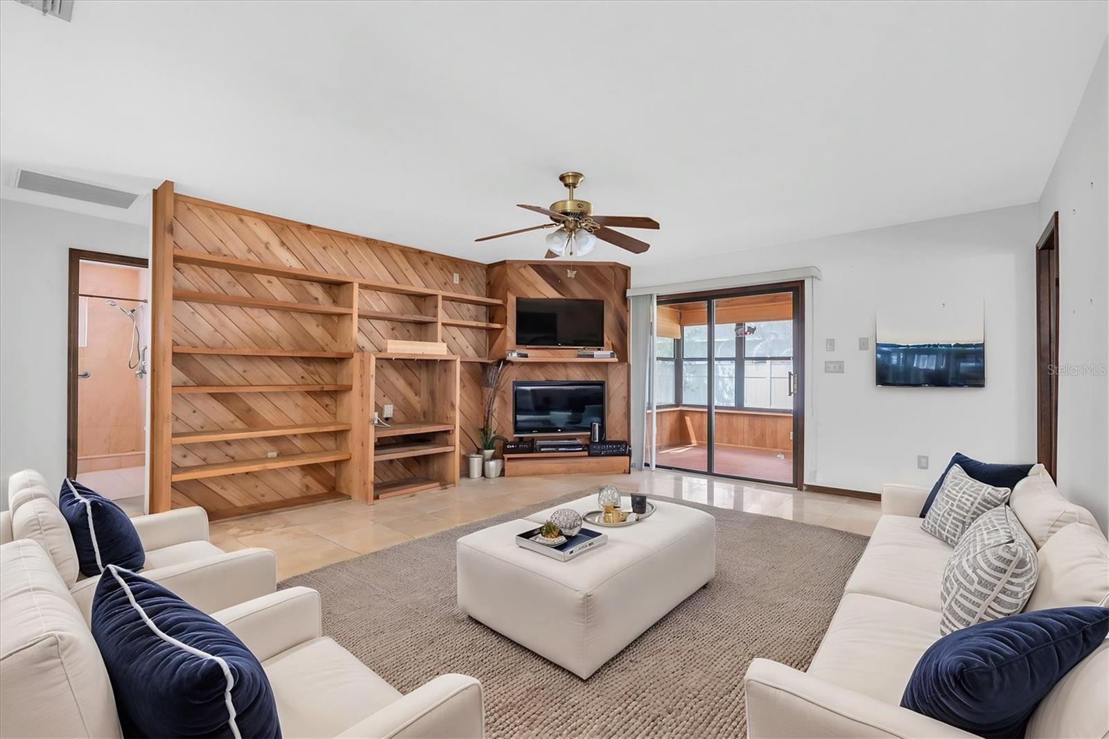 Virtual Staging of family room w/fireplace.