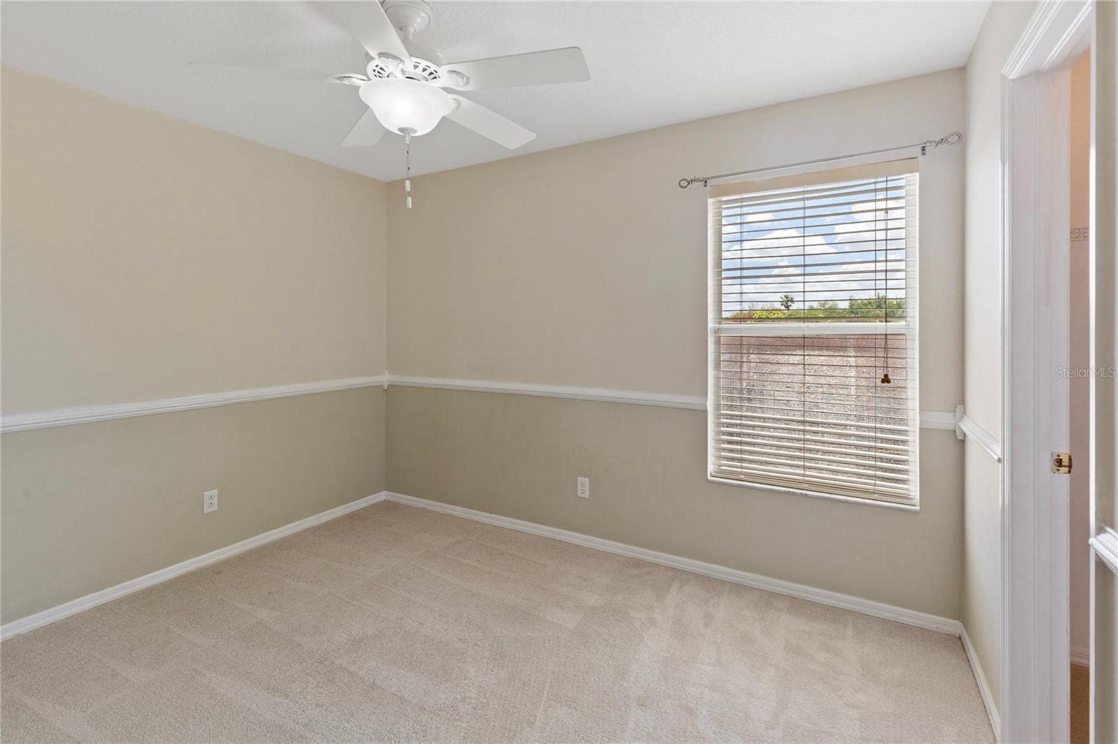 Fifth bedroom with chair rail