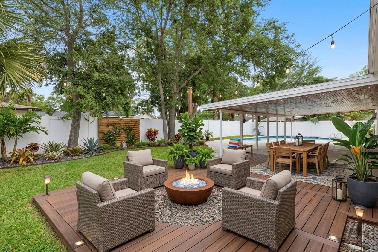 Virtually staged photo with idea of what you could do with the fire pit area.