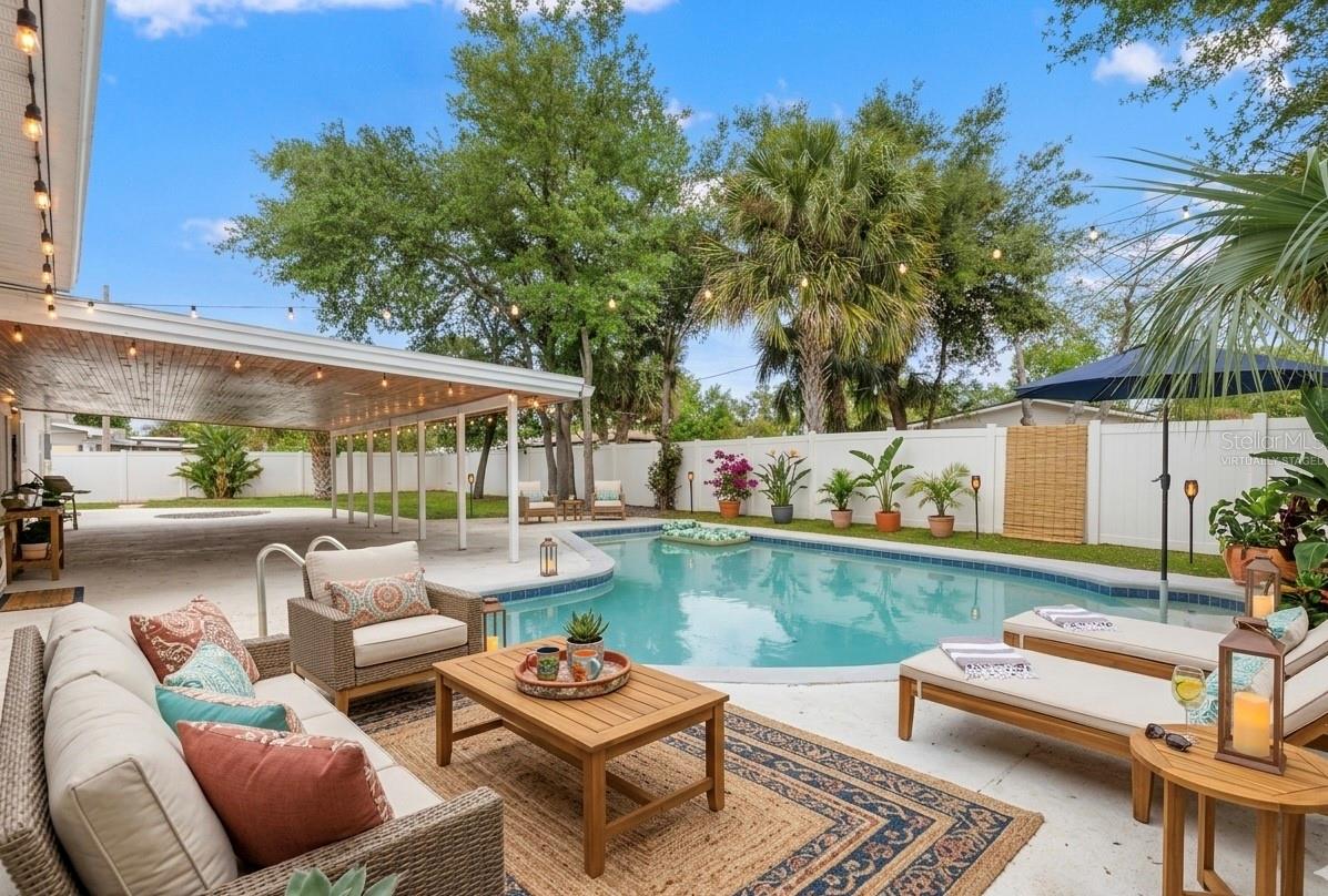 virtually staged design idea for surrounding pool area