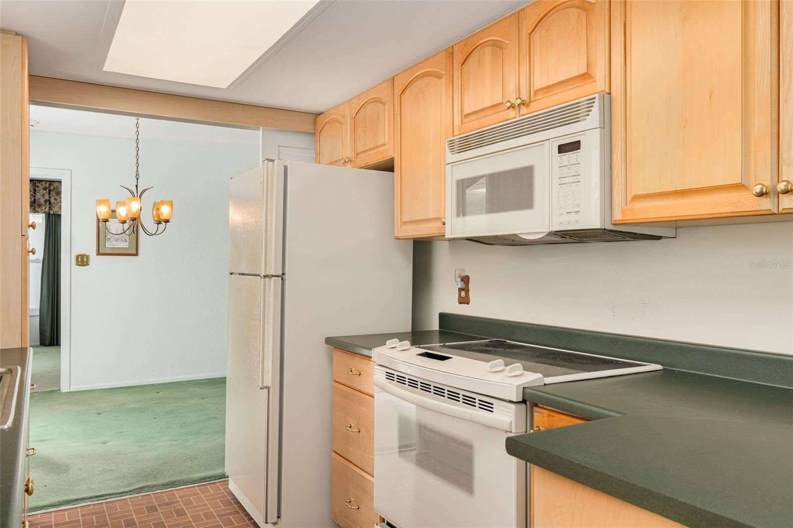 Kitchen overlooking backyard