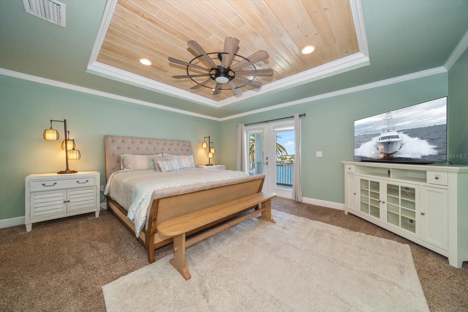 Coastal meets modern living in the lovely primary suite.
