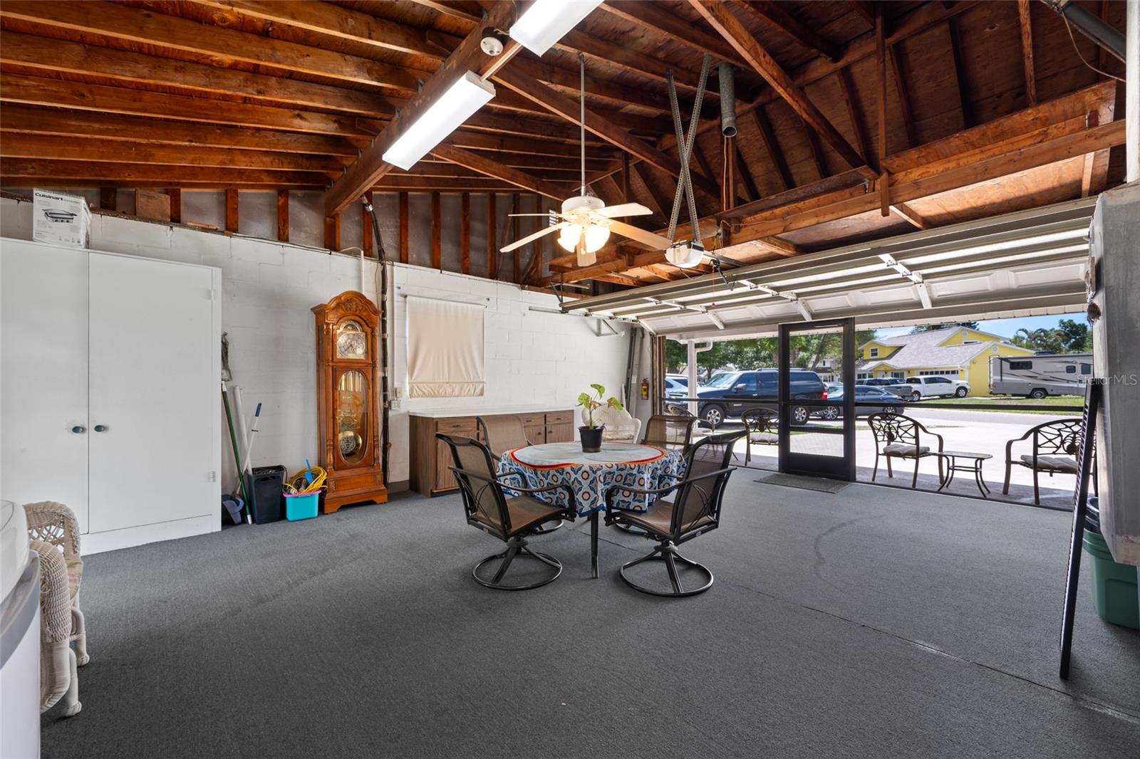 Garage has screen enclosure with a door.  This could easily be removed.