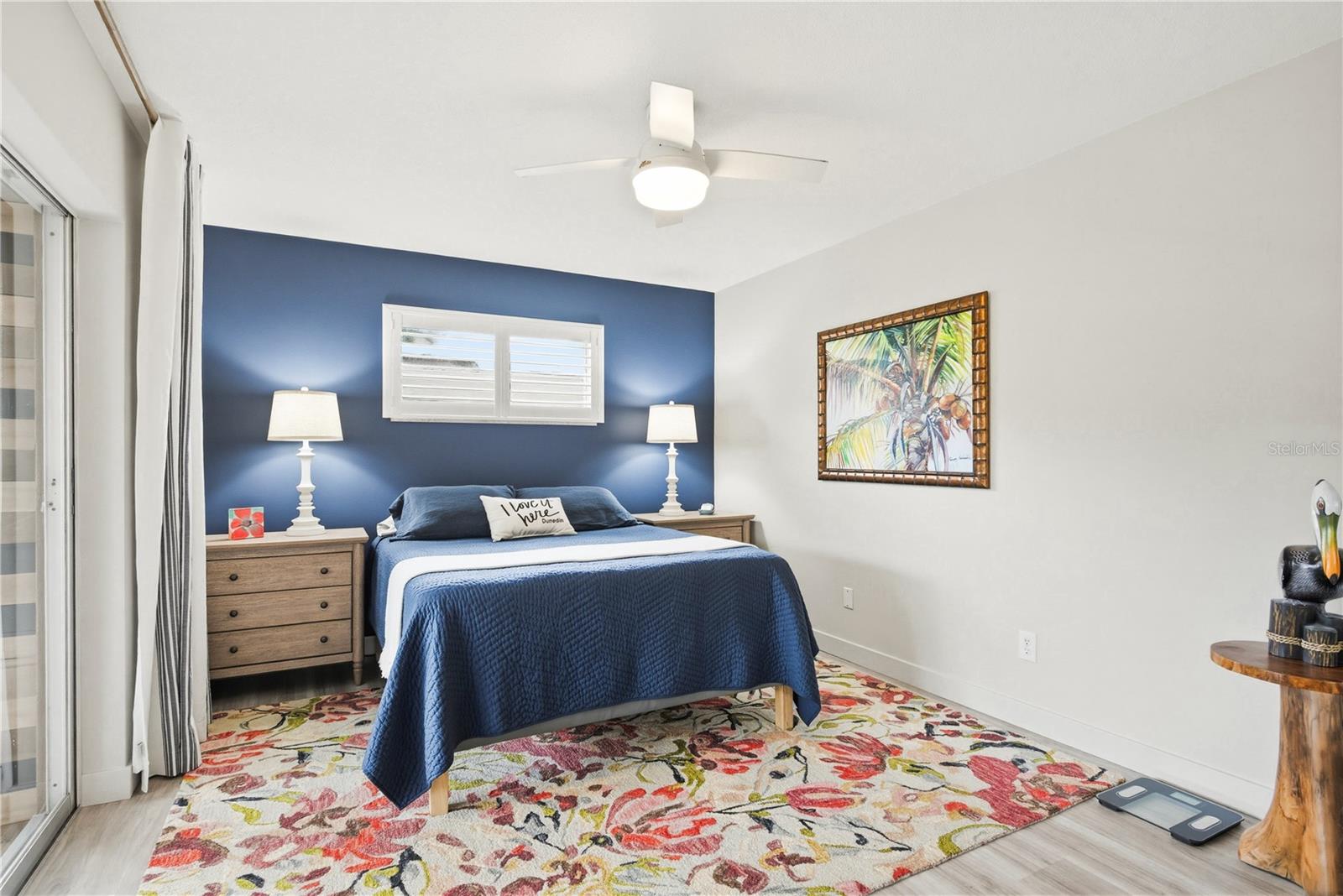 Primary Bedroom with sliders to the screened in lanai.