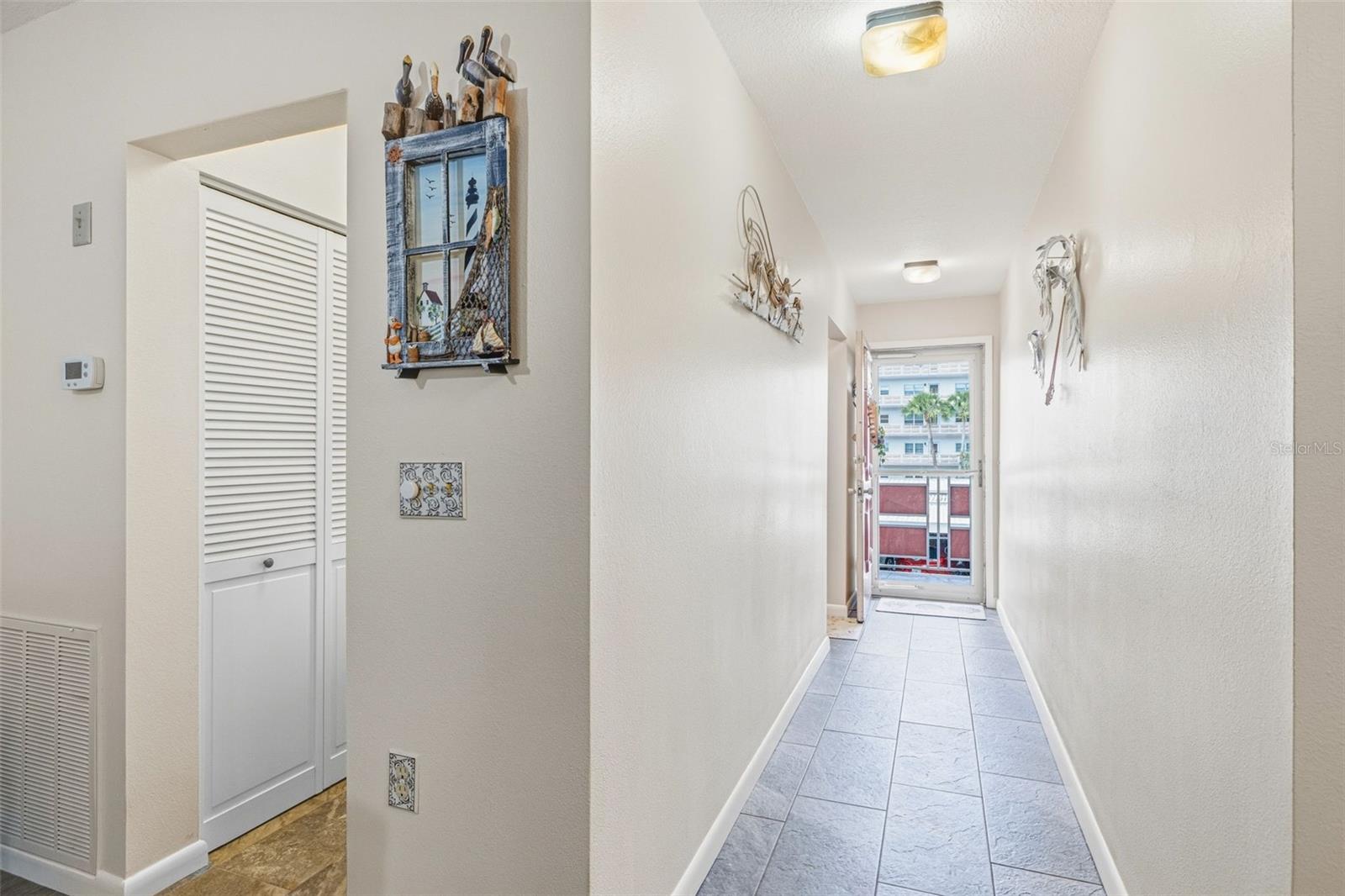 Hallway leading to main living areas