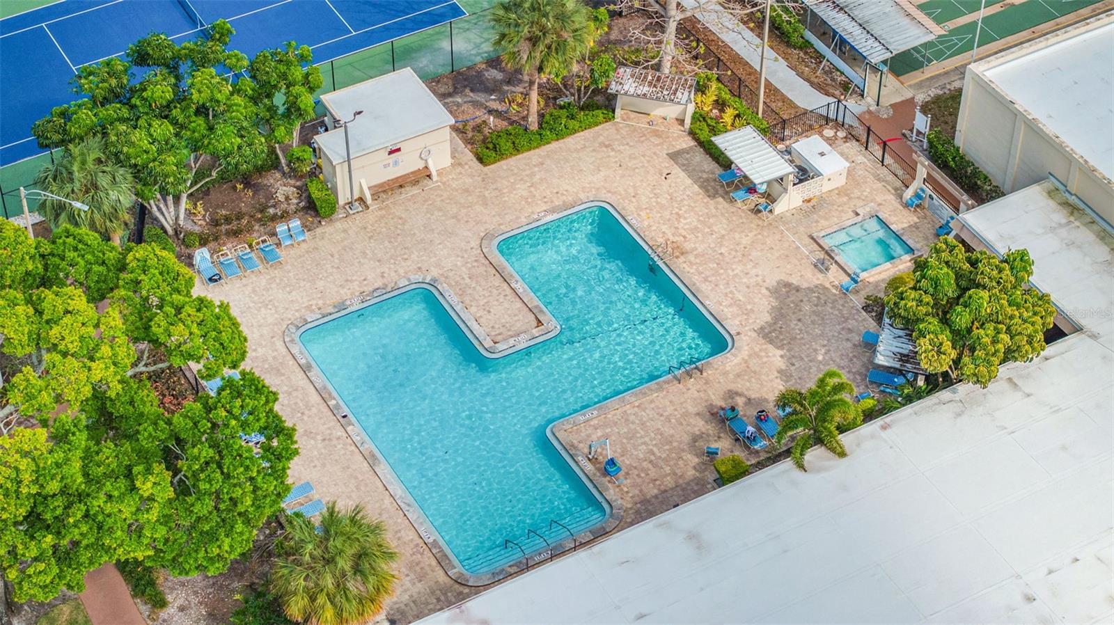 Aerial view of pool and community amenities