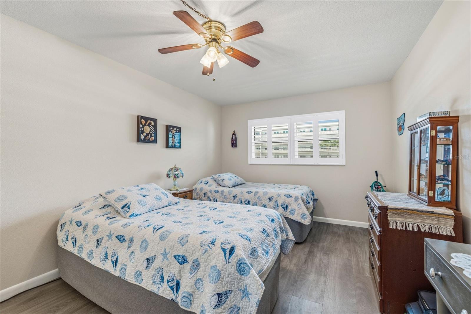 Primary bedroom with ample space and storage