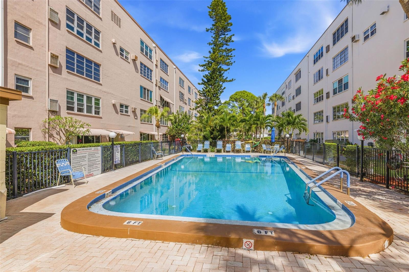 Resort style pool area with seating