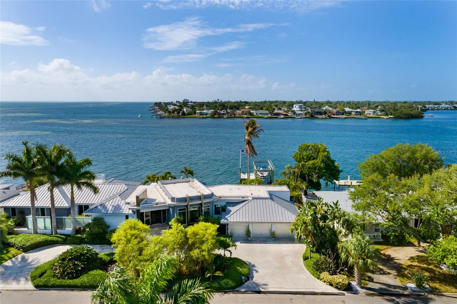 Stunning aerial of private waterfront residence on open Tampa Bay