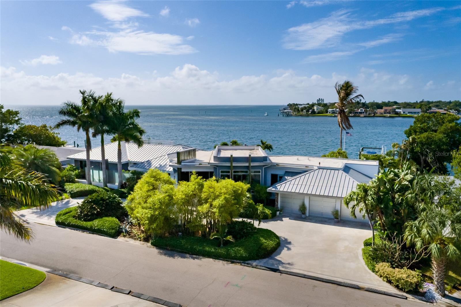 The circular drive and three car garage allow for ample parking.