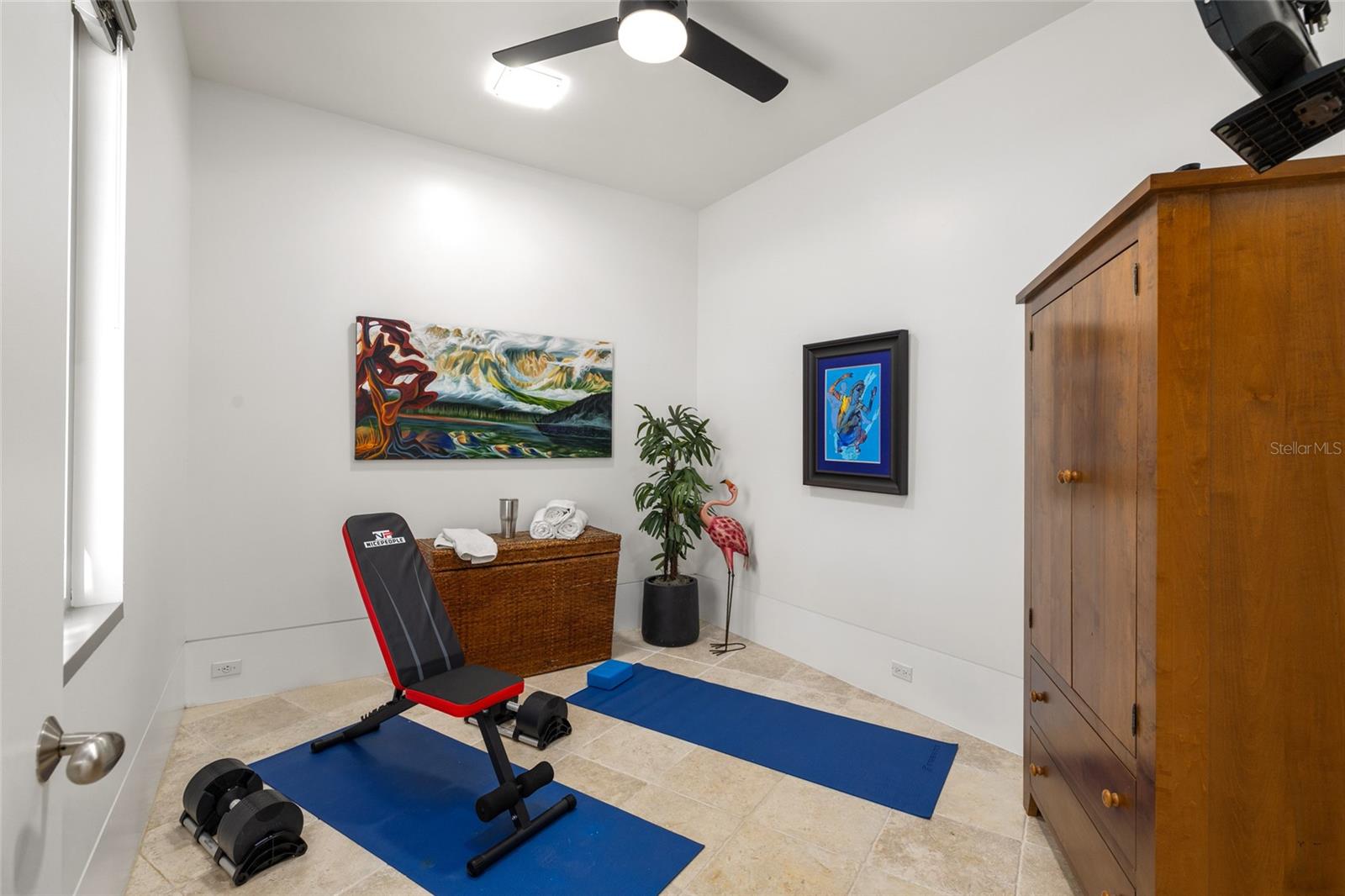 Flexible bonus room ideal for a home gym, office, or wellness studio