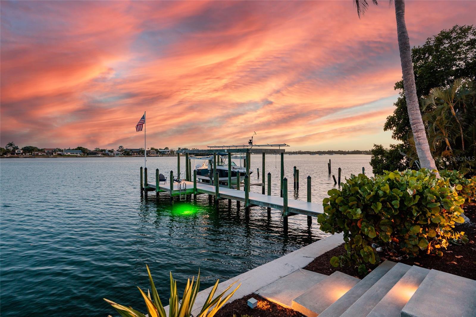 Private deep-water dock with breathtaking open bay sunset views