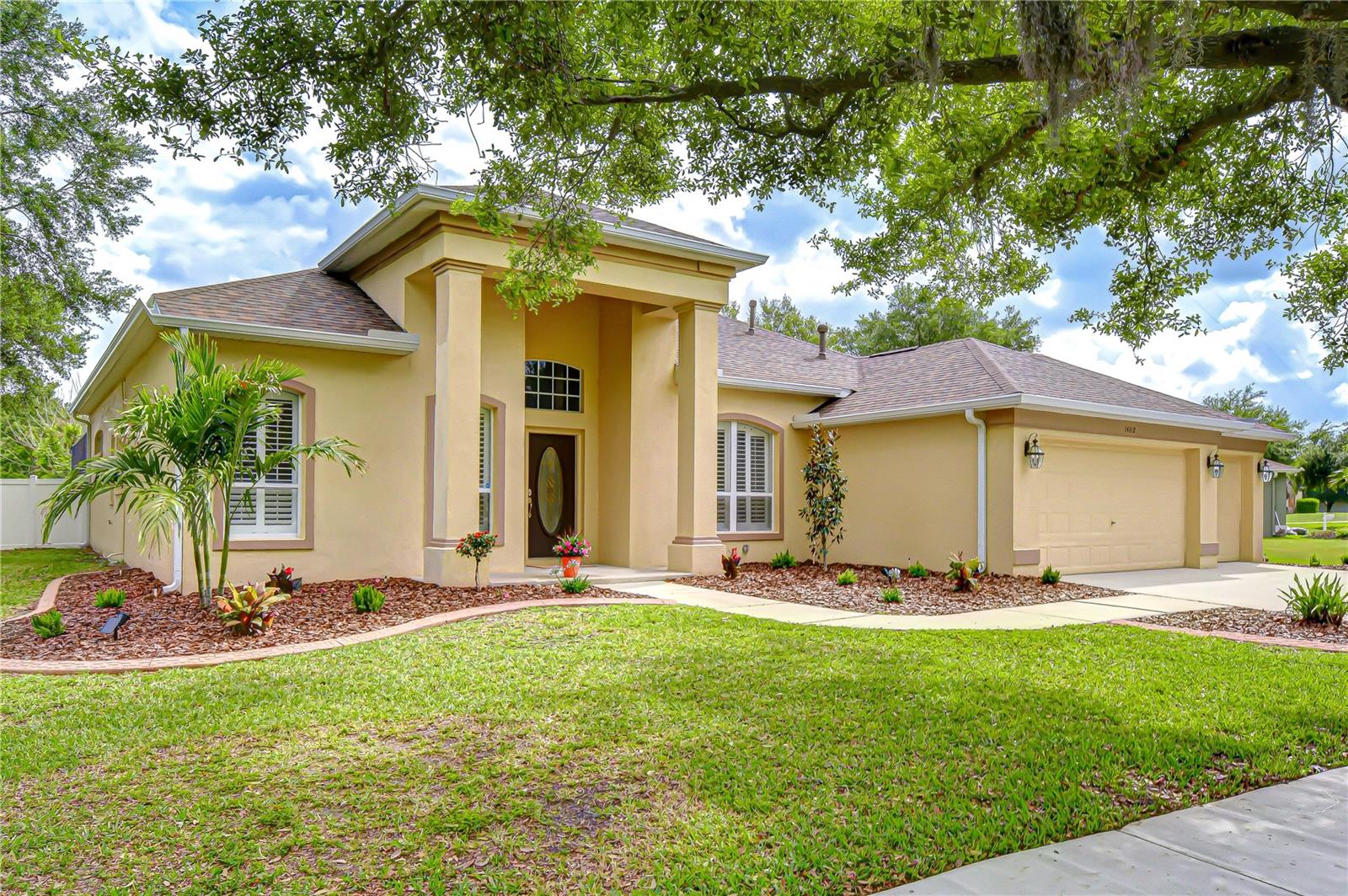 Beautifully renovated gated pool home on an oversized pie-shaped lot.