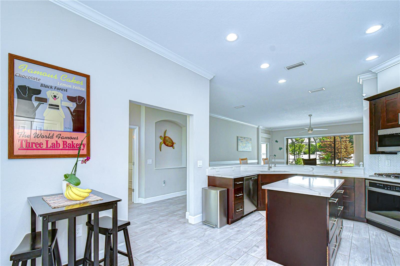 Solid quartz countertops with ample workspace.