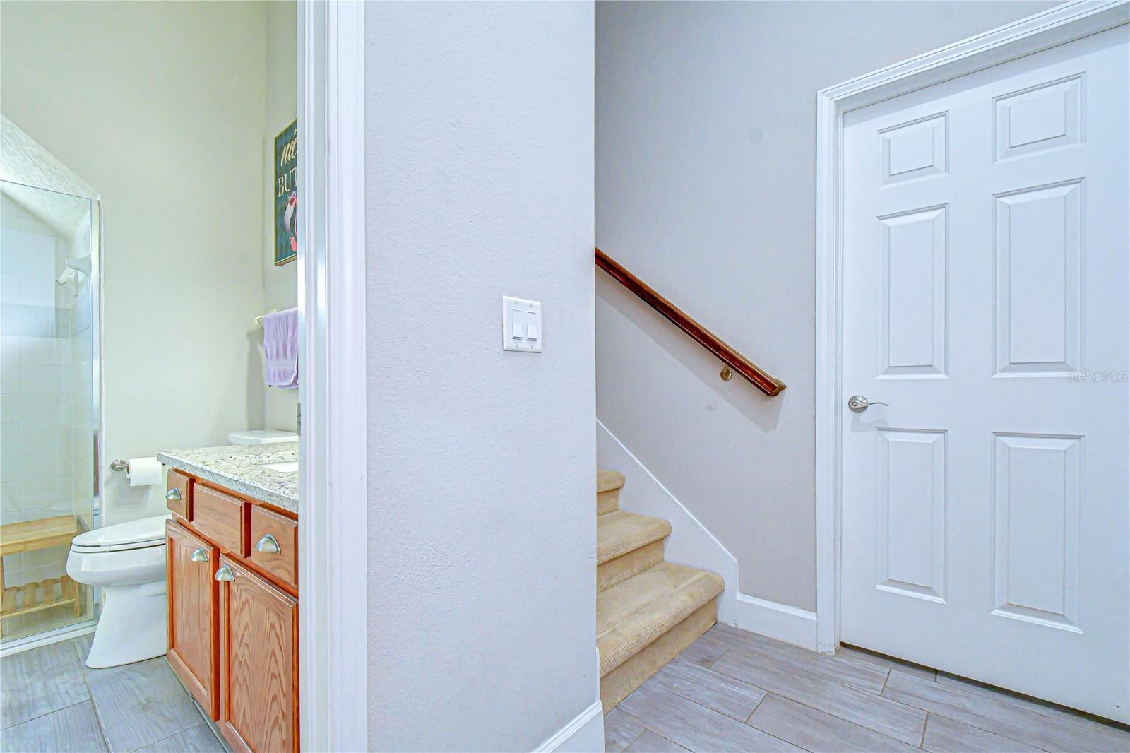 Bathroom beside staircase