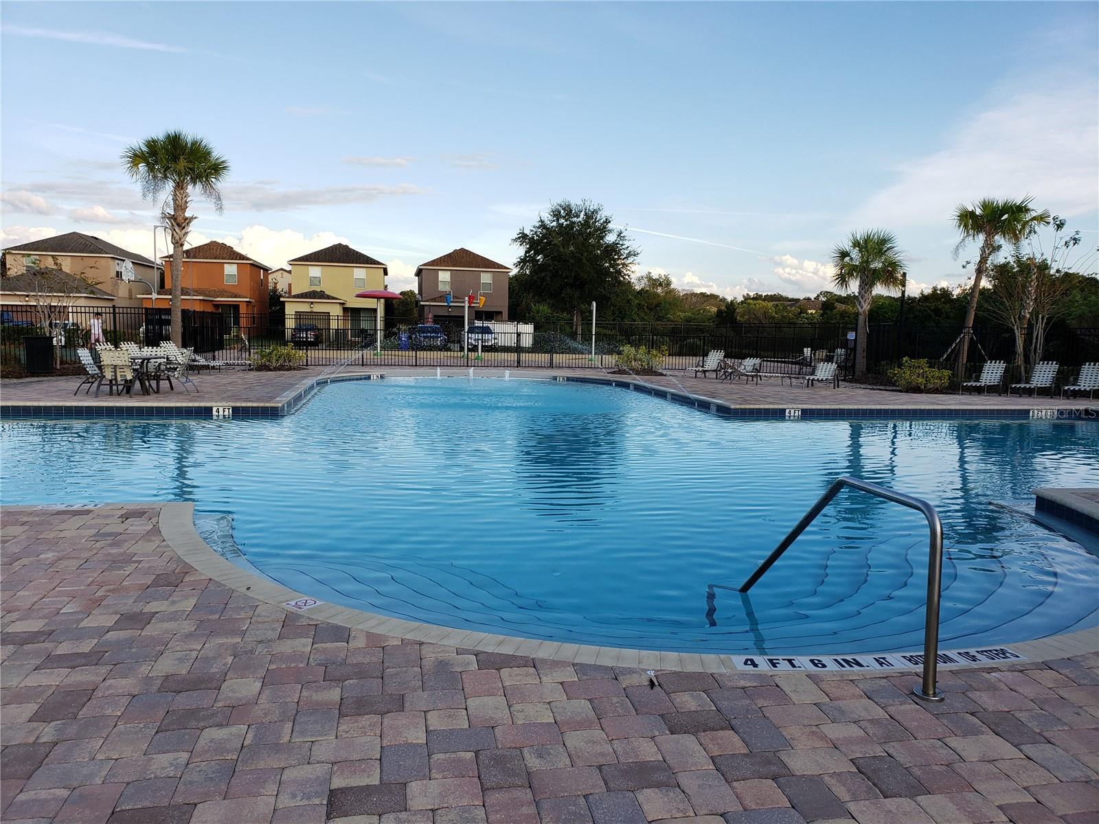 Resort-style community pool offering a relaxing retreat just steps from home—ideal for unwinding, socializing, and enjoying the Florida lifestyle year-round.