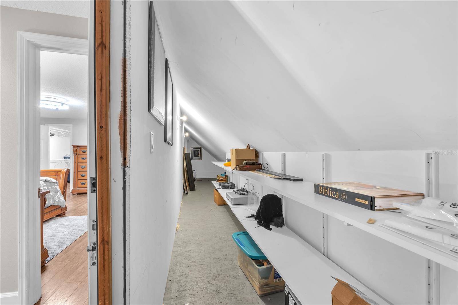 Additional storage area with access from 2nd floor landing between the primary and secondary bedrooms.