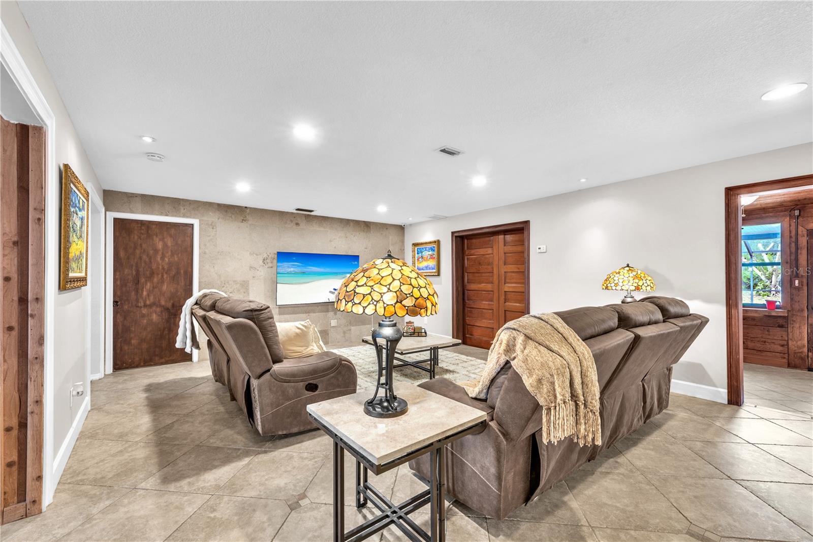 Straight from the foyer into a large living room.