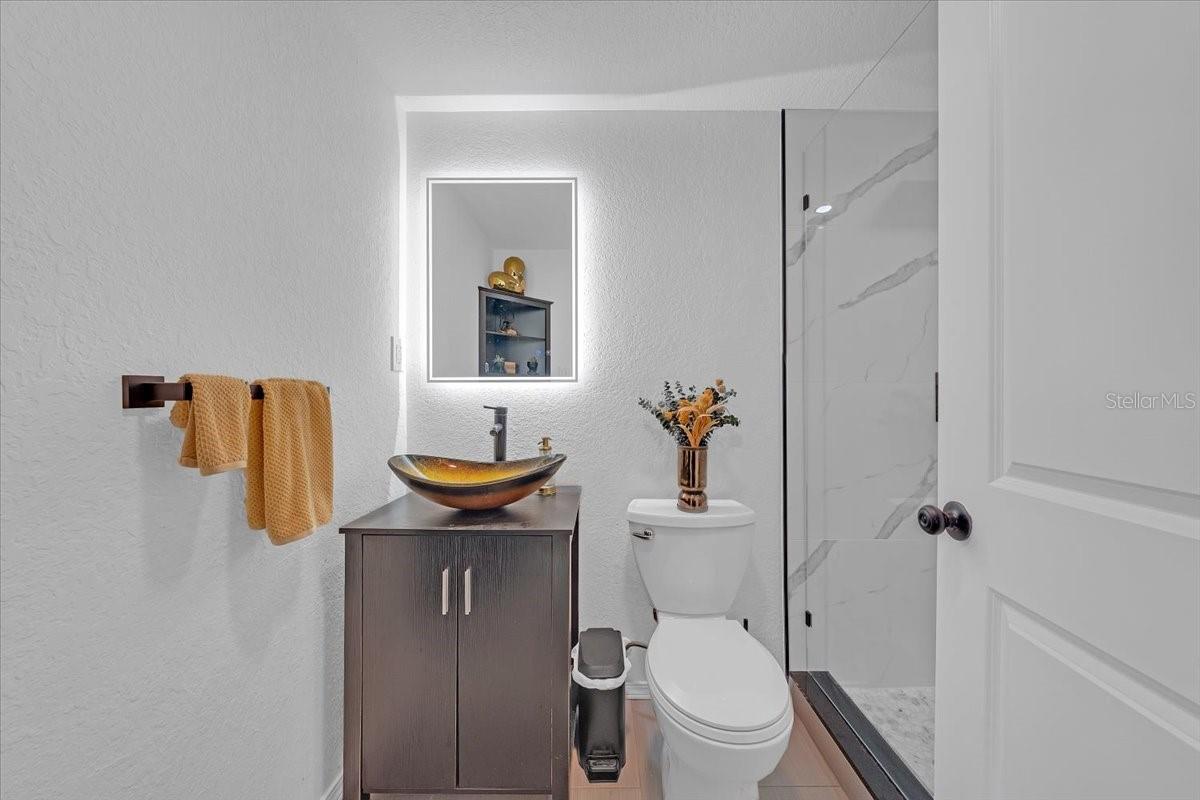 Another bathroom with shower.