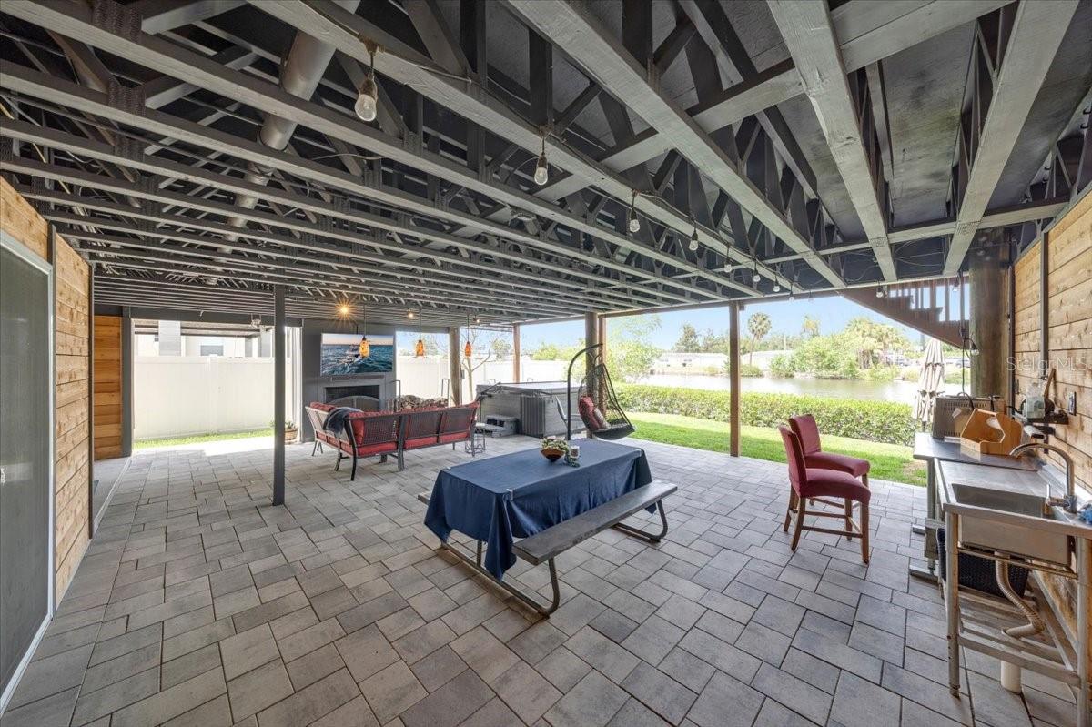 Pre-plumbed space ready for custom kitchen build.