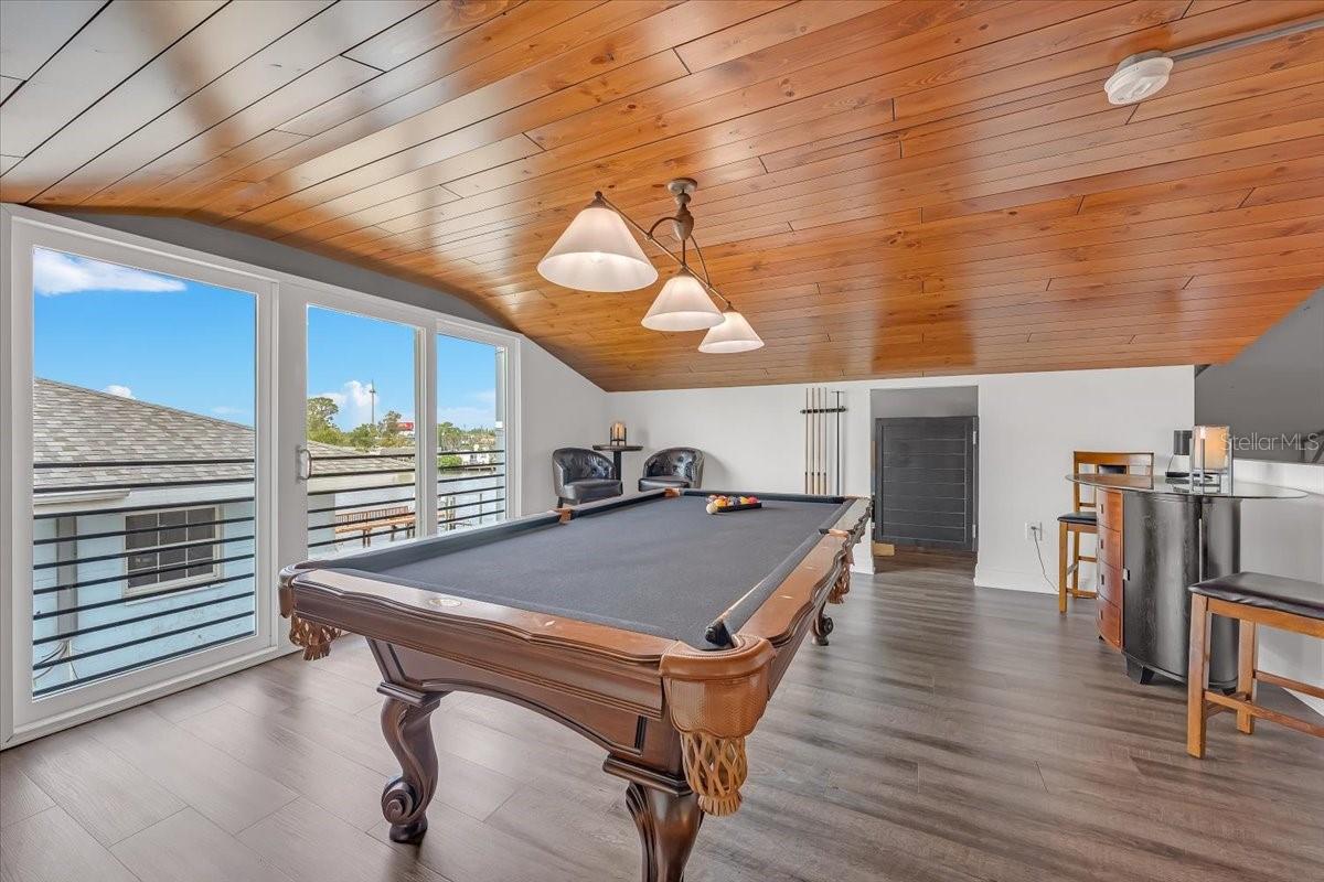 Flexible upper-level entertaining space.