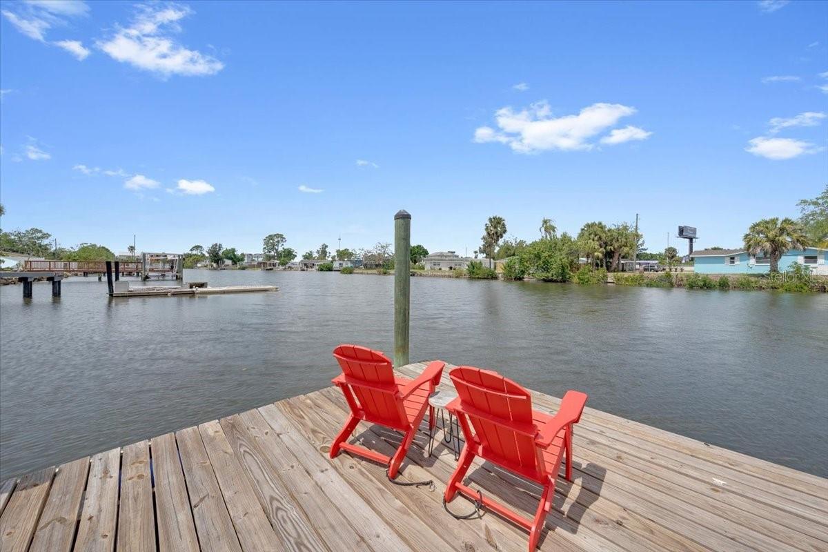 Floating dock with boat lift capability.