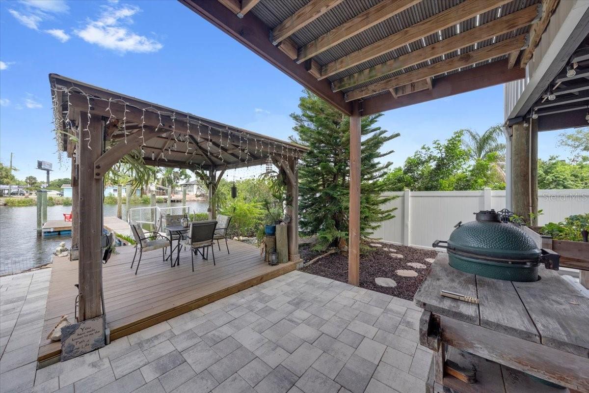 Charming waterfront gazebo for relaxing and enjoying sunsets.