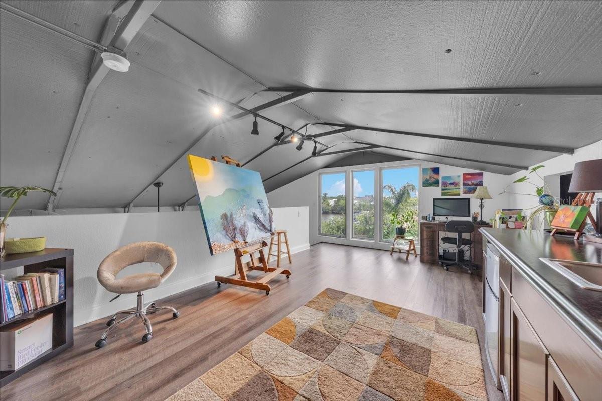 Workspace area with outdoor views and natural light.